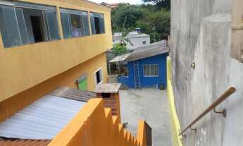 Imagem 3: São 3 casas,com 2 alugadas