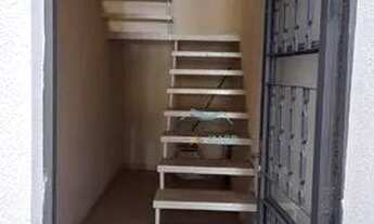 Imagem 2: Sobrado com galpão localizado em um terreno com área total de 287 metros quadrados