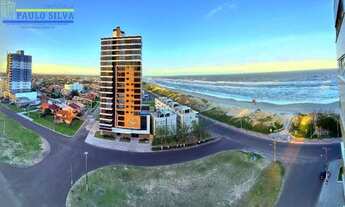 Imagem: A meia quadra do mar, centro de Tdaí, apto