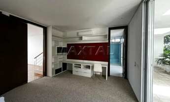 Imagem 2: Sobrado com 3 dormitórios, 3 suítes, 2 salas, 3 banheiros,10 vagas de garagem, piscina