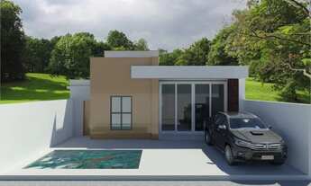 Imagem: Uma casa de 3 quartos sendo duas suítes