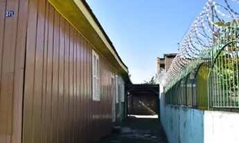 Imagem 2: Sozinha, 4 vagas, 2 quartos, pátio frente e fundos