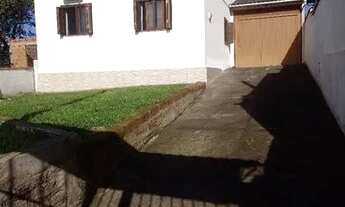 Imagem 6: Casa no bairro aparecida,murada com churrasqueira