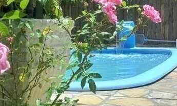 Imagem 2: Velleda oferece espetacular sítio todo arborizado com casa e piscina em Águas Claras