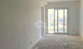 Imagem 4: Apartamento com 2 dormitórios, 1 suíte, 2 banheiros e com 2 vagas cobertas próximo ao Cent