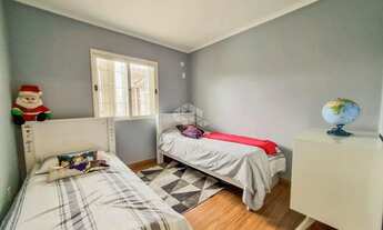 Imagem 4: Casa Térrea 3 Dormitórios 1 suíte, churrasqueira, amplo pátio, 3 vagas garagem, próxima ao