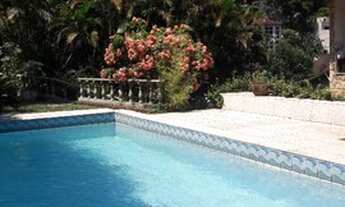 Imagem 6: Casa de condomínio para venda tem 430 metros quadrados com 4 quartos