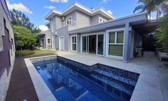 Imagem: Casa com 4 Suítes à venda, Loteamento