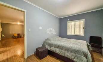 Imagem 6: Casa Térrea 3 Dormitórios 1 suíte, churrasqueira, amplo pátio, 3 vagas garagem, próxima ao