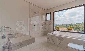 Imagem 6: Casa de condomínio para venda tem 370 metros quadrados com 4 quartos