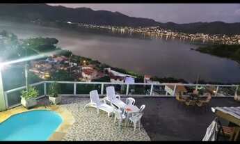 Imagem 5: Casa com piscina e vista deslumbrante