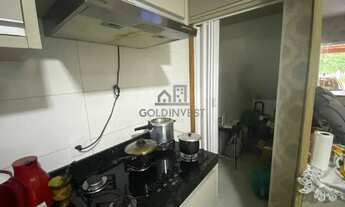 Imagem 6: Exclusiva Casa Geminada no Aimoré: Deck de Madeira Rústica com Vista para a Floresta e Rio