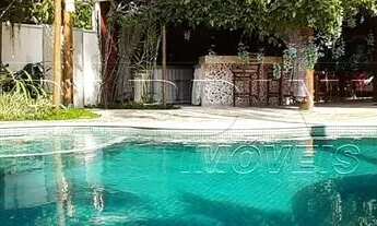 Imagem 7: Casa de temporada em condomínio com piscina e espaço gourmet, a 130 metros da Praia do Láz