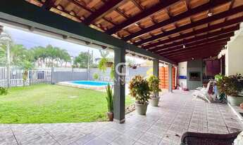 Imagem 6: Casa térrea com 3 dormitórios, piscina e amplo quintal em terreno de 525m²