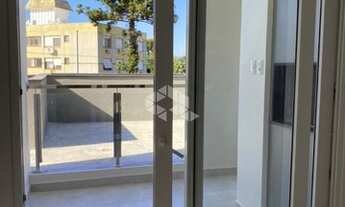 Imagem 3: Apartamento com 2 dormitórios, 1 suíte, 2 banheiros e com 2 vagas cobertas próximo ao Cent