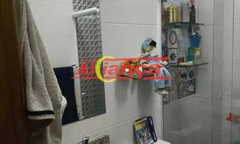 Imagem 2: Apartamento com 2 dormitórios, móveis planejados, ar-condicionado e 1 vaga. Pronto para mo