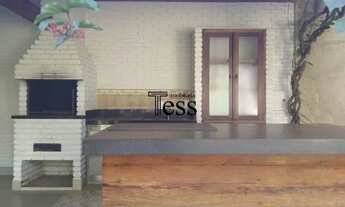 Imagem 7: 3 dormitorios sendo 2 suítes, cozinha planejada com coifa rica em armarios