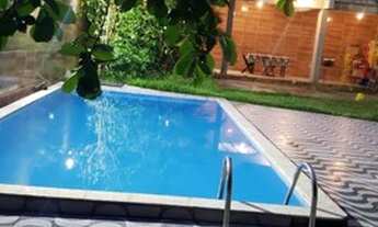 Imagem: Casa com piscina e poço artesiano