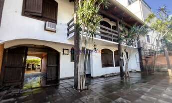 Imagem 2: Casa com 5 quartos, 5 vagas e 265m² à venda no bairro Tristeza