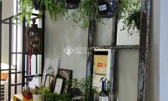 Imagem: Apartamento com sacada e churrasqueira