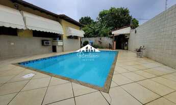 Imagem 2: Casa à venda com 3 quartos, sendo 01 suíte, piscina, sauna e churrasqueira dentro de condo