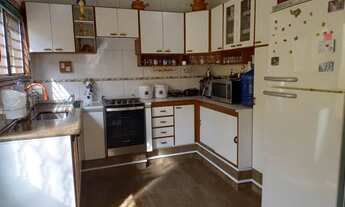 Imagem: Vendo uma linda casa no Portal do Éden