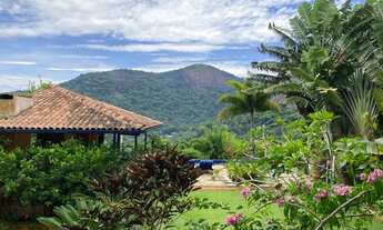 Imagem 2: Vista para as montanhas, muito espaço e tranquilidade nessa casa próxima a praia da Joatin