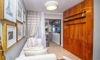 Imagem 2: Apartamento de 2 quartos suite, sacada com churrasqueira desocupado e 1 vaga