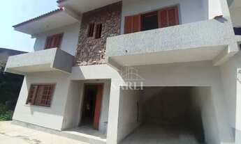 Imagem 2: Casa com 3 dormitórios à venda, 200 m² por R$ 850.000 - Barreiros - São José/SC