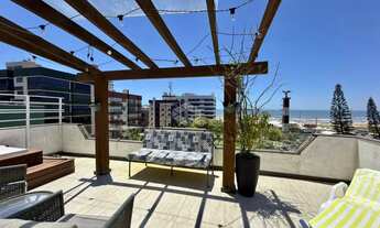 Imagem 2: Cobertura com 3 dormitórios sendo 1 suíte mobiliada com Vista Mar e vaga de garagem em Cap