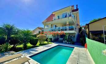 Imagem: Casa com 4 quartos e 6 vagas à venda no