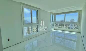 Imagem 2: Apartamento para Venda em Tramandaí, Centro, 2 dormitórios, 2 suítes, 3 banheiros, 1 vaga