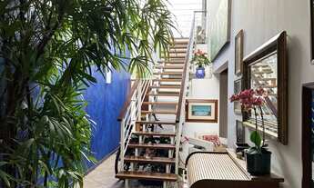 Imagem: Casa estilo descolada, pé direito duplo