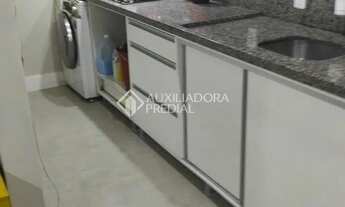 Imagem 4: Apartamento com sacada e churrasqueira