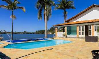 Imagem: Casa com piscina a beira da Represa de Camargos
