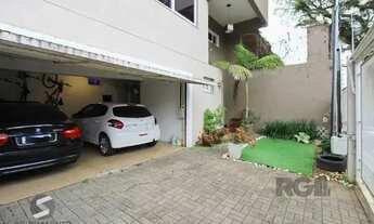 Imagem 6: Casa em Porto Alegre, no bairro Tristeza, com 3 dormitório(s), e 3 banheiros, à