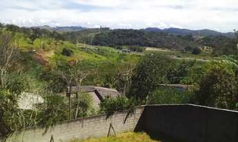 Imagem: Terreno de 512m² fechado de muro com casa