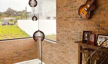 Imagem 5: Casa de condomínio para venda tem 256 metros quadrados com 4 quartos