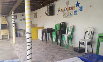 Imagem 3: Área de lazer com piscina e casa