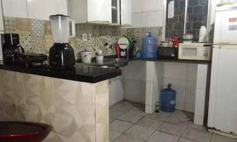 Imagem 3: Vendo casa no pôr do sol