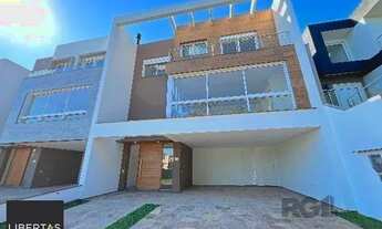 Imagem 2: Casa Condominio em Porto Alegre, no bairro Hípica, com 3 dormitório(s), e 3 banh