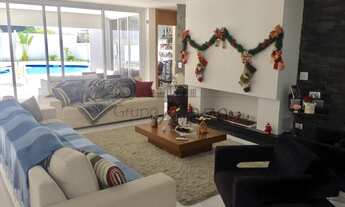 Imagem 4: Casa de condomínio para venda possui 613 metros quadrados com 6 quartos