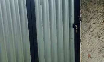 Imagem: Terreno com pequena casa