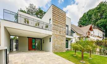 Imagem 2: Casa de condomínio para aluguel e venda possui 340 metros quadrados com 4 quartos