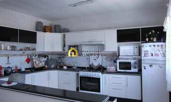 Imagem: Sobrado residencial com salão comercial