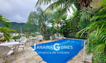 Imagem 2: Casa sofisticada com 4 quartos, 3 suítes, jardins e área de lazer