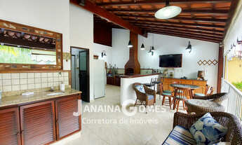 Imagem 6: Casa sofisticada com 4 quartos, 3 suítes, jardins e área de lazer