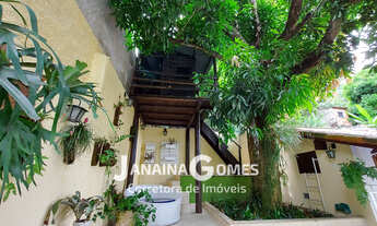 Imagem 3: Casa sofisticada com 4 quartos, 3 suítes, jardins e área de lazer