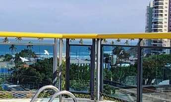 Imagem 2: Cobertura alto padrão com sacada gourmet e vista parcial do mar, com lazer no condomínio e