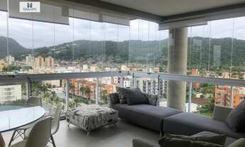 Imagem 4: Apartamento 2 dormitórios sendo 2 suítes com sacada sala-suíte gourmet vista mar, ar condi